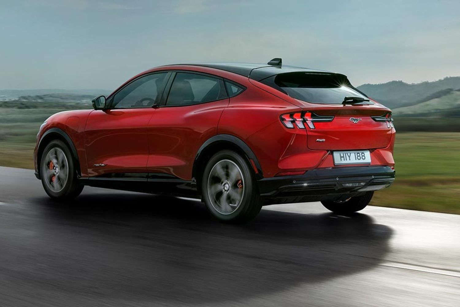 Ford Mustang mach e gt exterior side driving in country