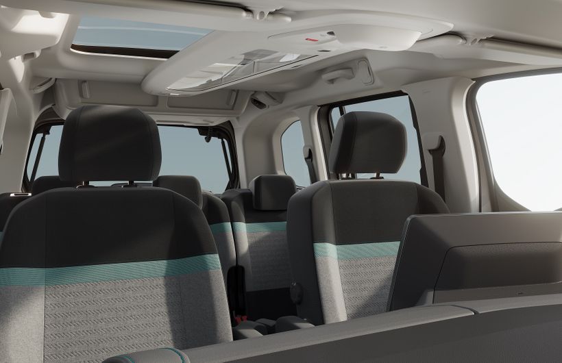 Citroen Berlingo electric interior in studio, looking bak over seats from the windscreen