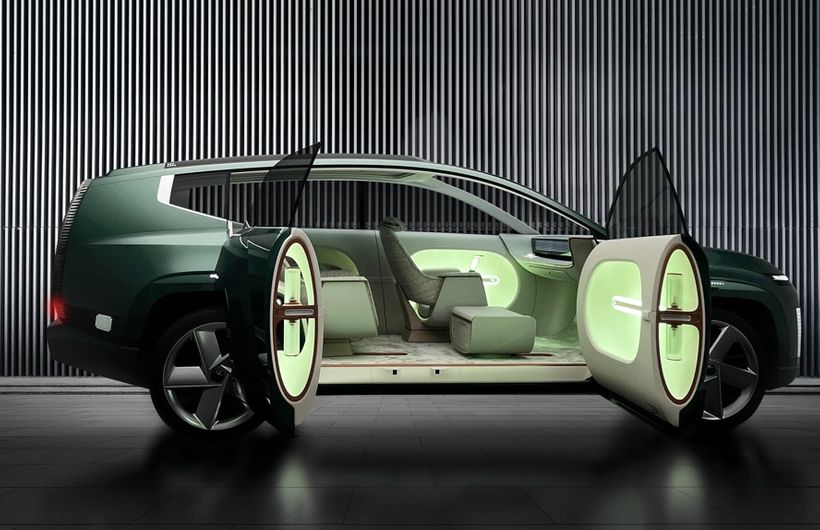 Hyundai Seven concept car with doors open, side on, in studio