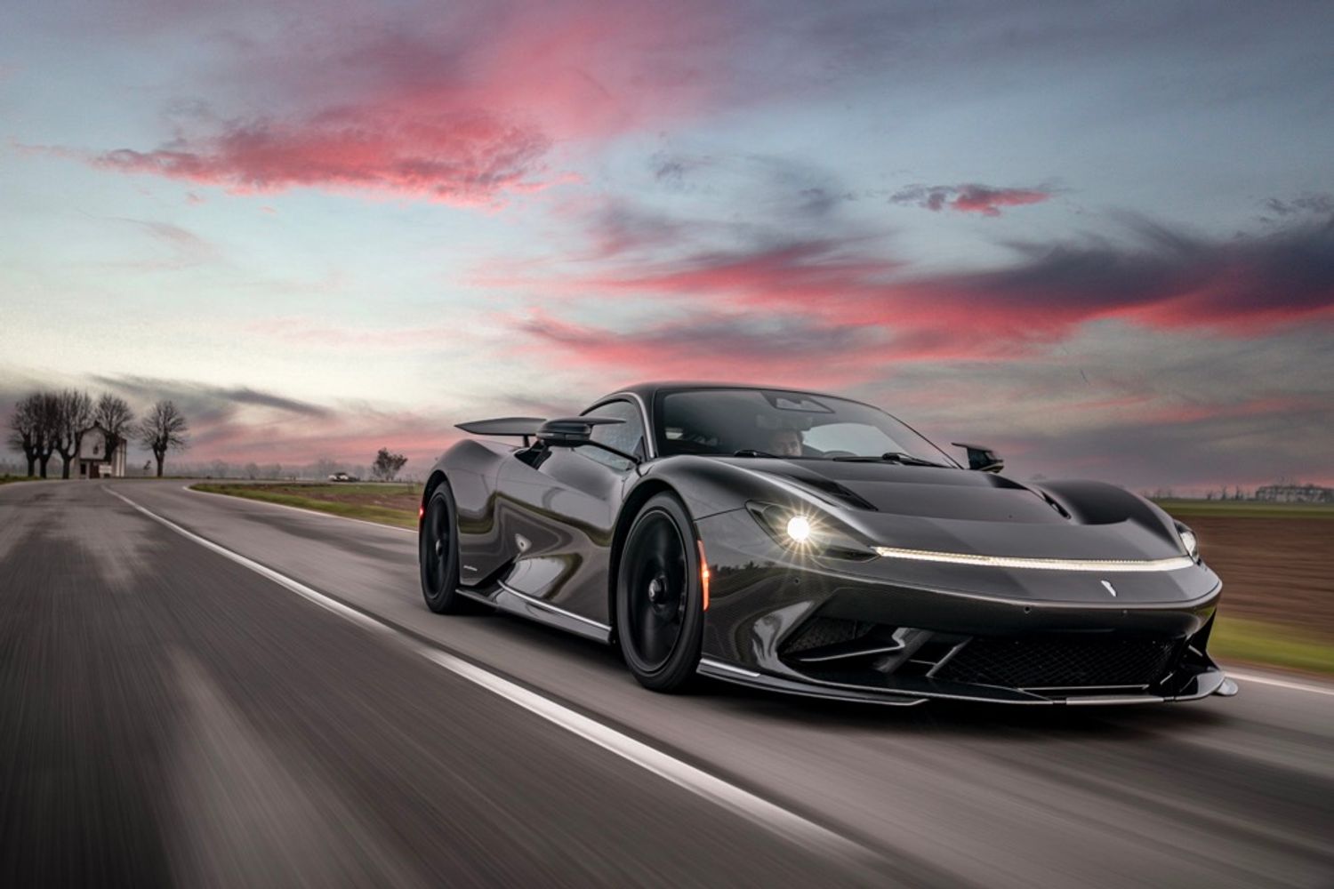 Pininfarina Battista front tracking, dramatic sky