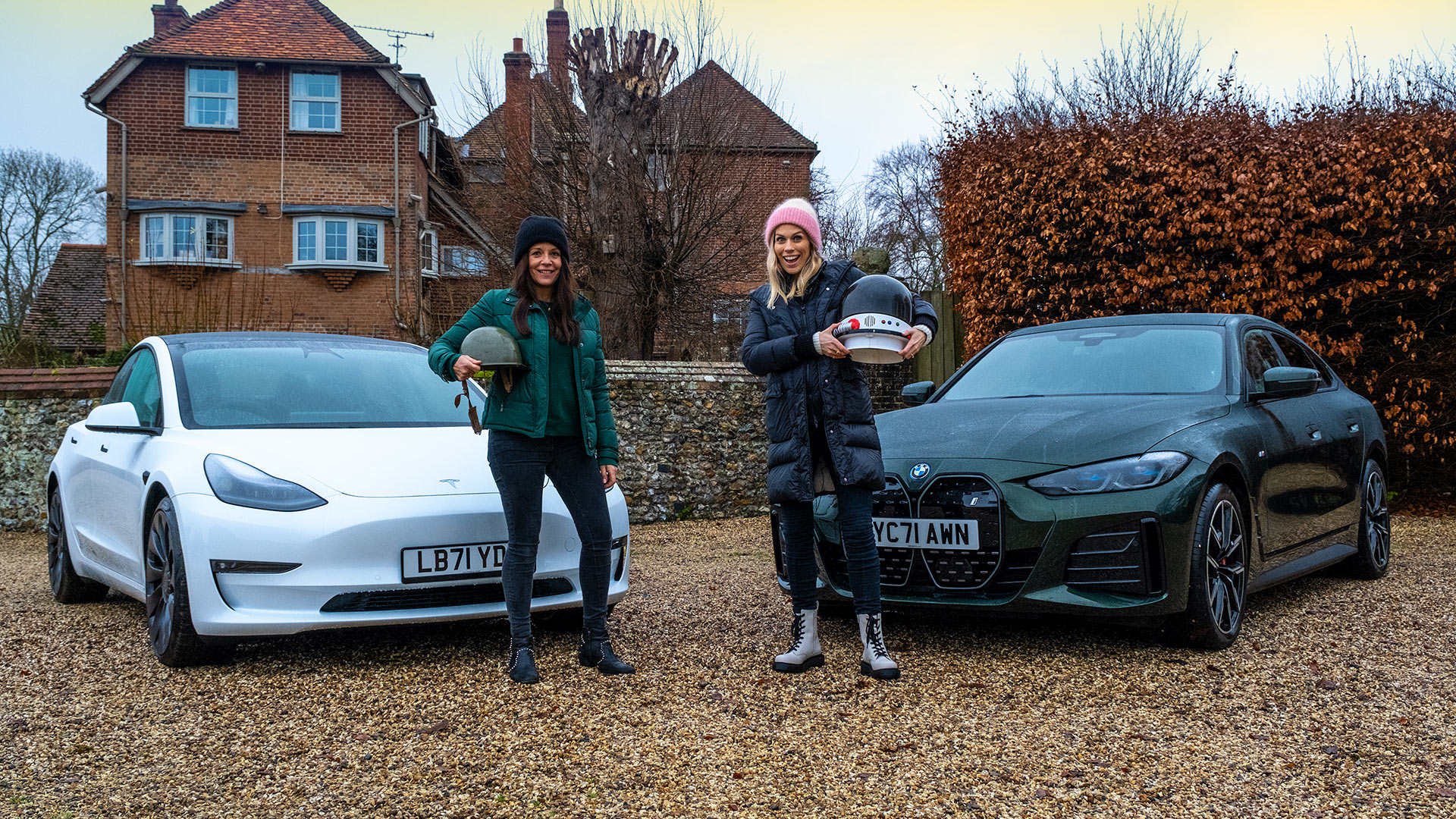 Ginny Buckley and Nicki Shields with Tesla Model 3 and BM i4
