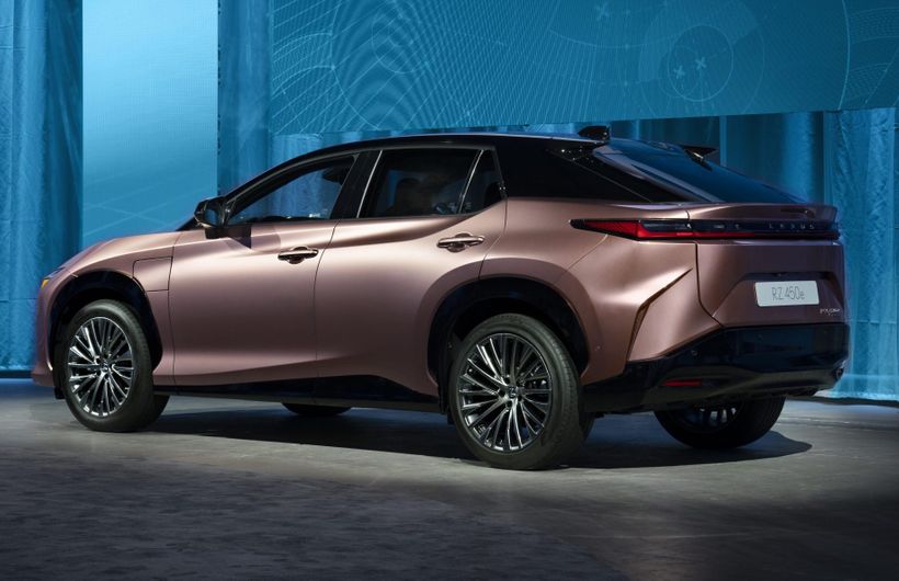 Lexus RZ 450e static rear, copper, on stage