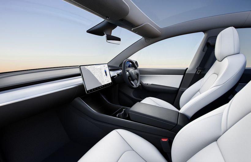 Tesla Model Y interior, white trim, right hand drive