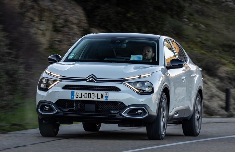 Citroen e-C4 X, front action, white car, French registered
